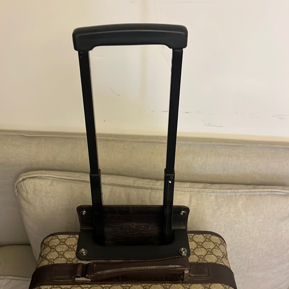 GUCCI carry on overnight monogram print.